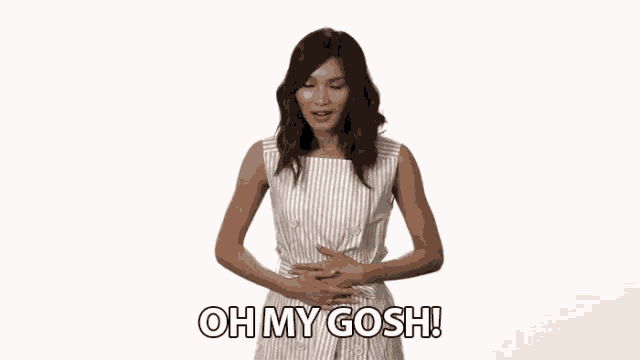 a woman is holding her stomach and says oh my gosh