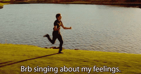 a man is running near a body of water with the words brb singing about my feelings below him