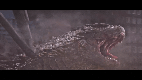 a close up of a dinosaur 's mouth with its mouth open