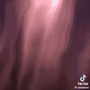 a tiktok video of a purple background with a pink glow