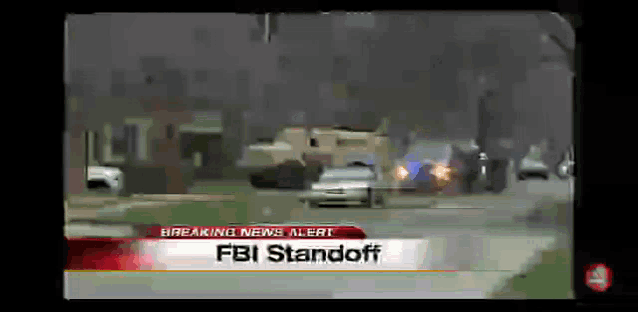 a breaking news alert for fbi standoff on a tv screen