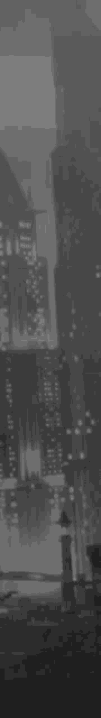 a black and white photo of a city with the year 2012 written in white letters