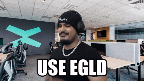 a man wearing headphones says use egld