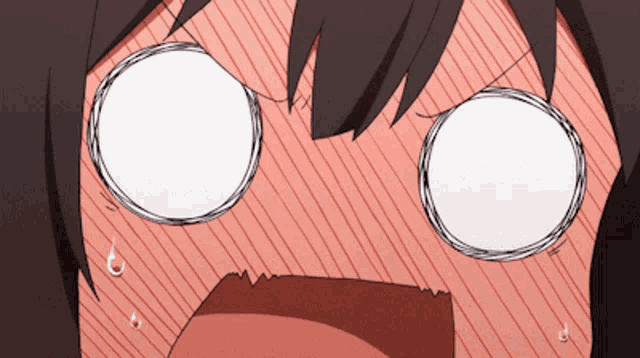 a close up of a person 's face with a surprised expression