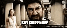 a man with a beard is standing in front of a woman and saying `` buy shipp now '' .