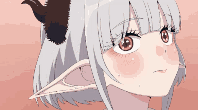 a girl with horns on her head and white hair