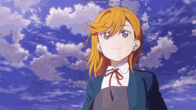 a girl with orange hair and blue eyes is standing in front of a blue sky .