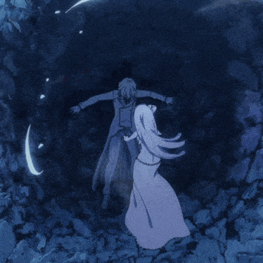 a man and a woman are standing next to each other and the man is holding a sword