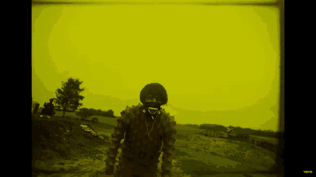 a yellow background with the word vevo in the corner