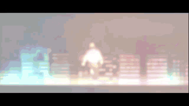 a blurry picture of a person walking in a dark room