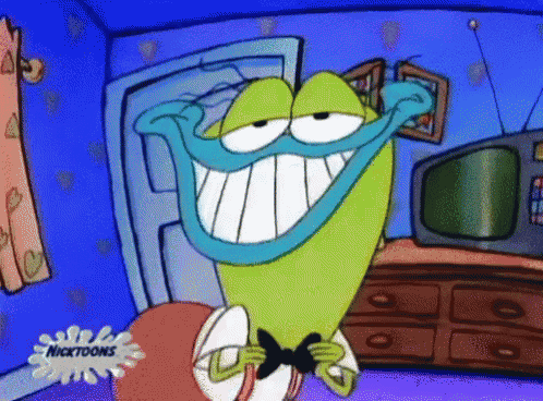 a cartoon character from nickelodeon is smiling in a room