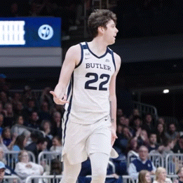 a basketball player wearing a butler jersey number 22