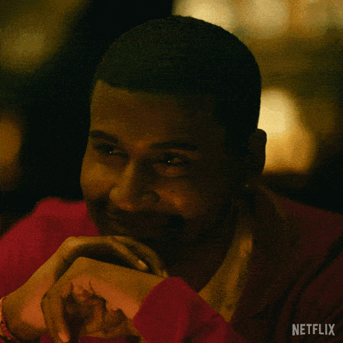 a close up of a man 's face with the word netflix on the bottom right