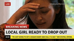 a woman is crying in front of a breaking news screen