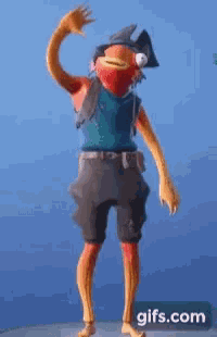 a fish in a pirate costume is dancing in front of a blue sky .