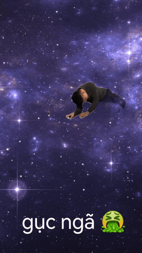 a man is kneeling down on the floor with the word guc nga written on the bottom