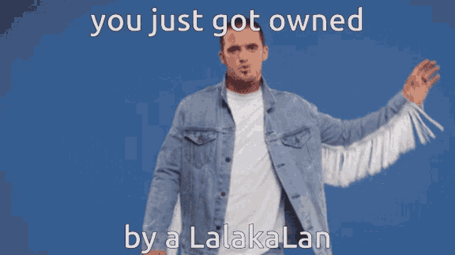 a man wearing a denim jacket with fringe on the sleeves and the words " you just got owned by a lalakalan "