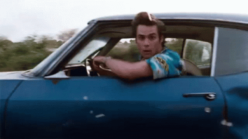 Ace Ventura Driving GIF - Ace Ventura Driving Binoculars GIFs
