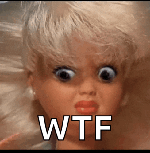 a doll is making a funny face and the words wtf are below it