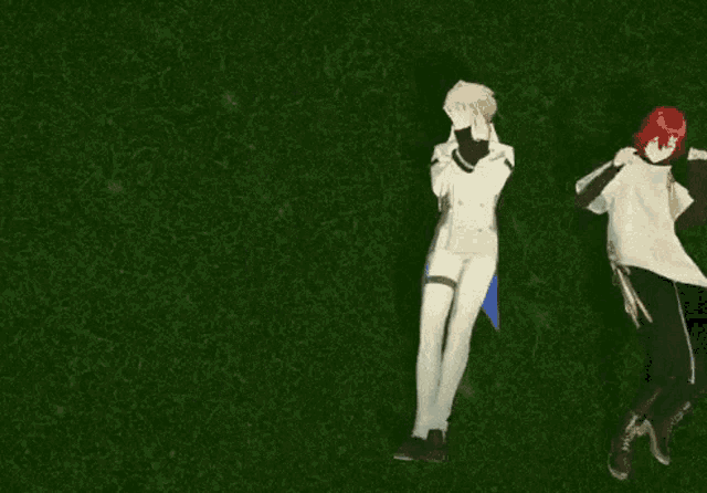 a man in a white suit is laying on the grass with another man .