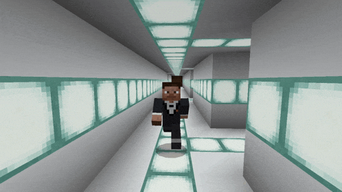 a man in a suit is walking down a hallway