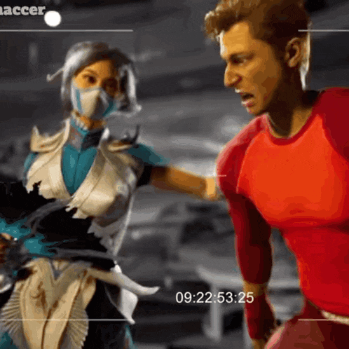a man in a red shirt is standing next to a woman in a mask with a time stamp of 9:22