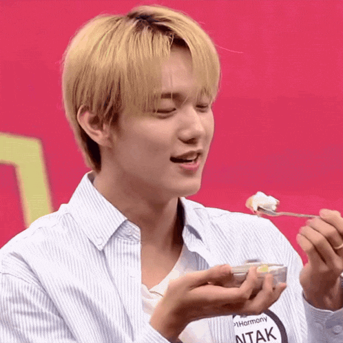 a young man with a name tag that says ' ntak '