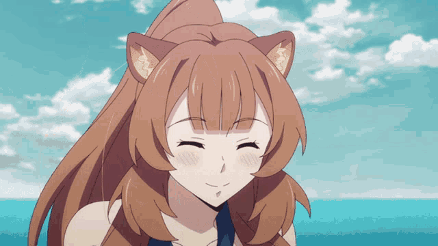 a girl with a cat ear on her head is smiling