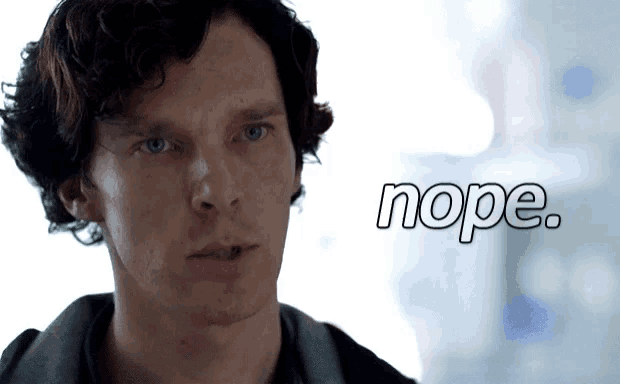 a close up of a man 's face with the word nope written below him
