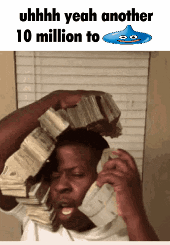 a man is talking on a phone while holding a pile of money