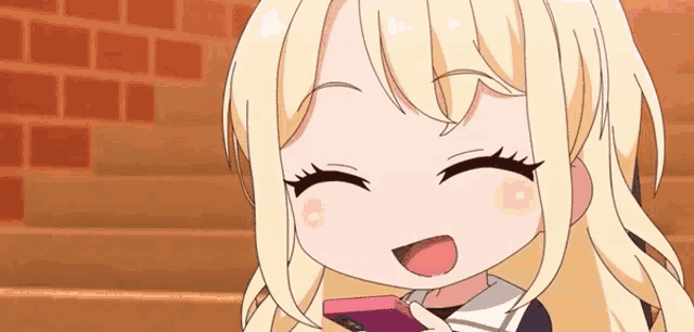 a girl with blonde hair is smiling while holding a cell phone