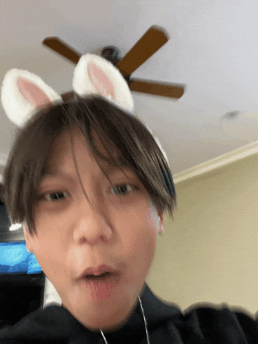 a person with bunny ears on their head