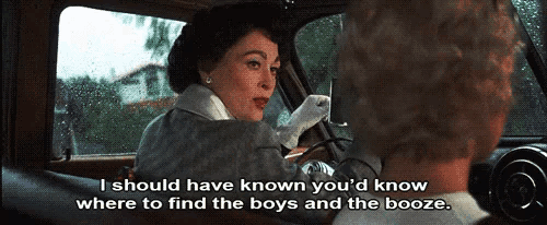a woman in a car says " i should have known you d know where to find the boys and the booze
