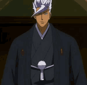 a man in a black kimono with a white feather on his neck
