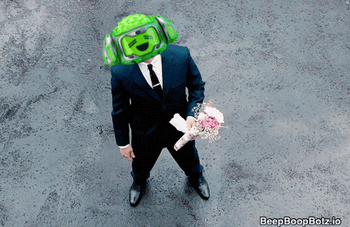 a man in a suit is holding a bouquet of flowers and has a green robot head on