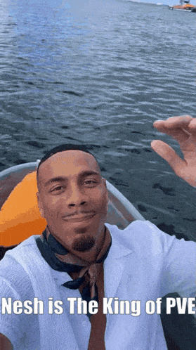 a man taking a selfie in a boat with the caption nesh is the king of pve