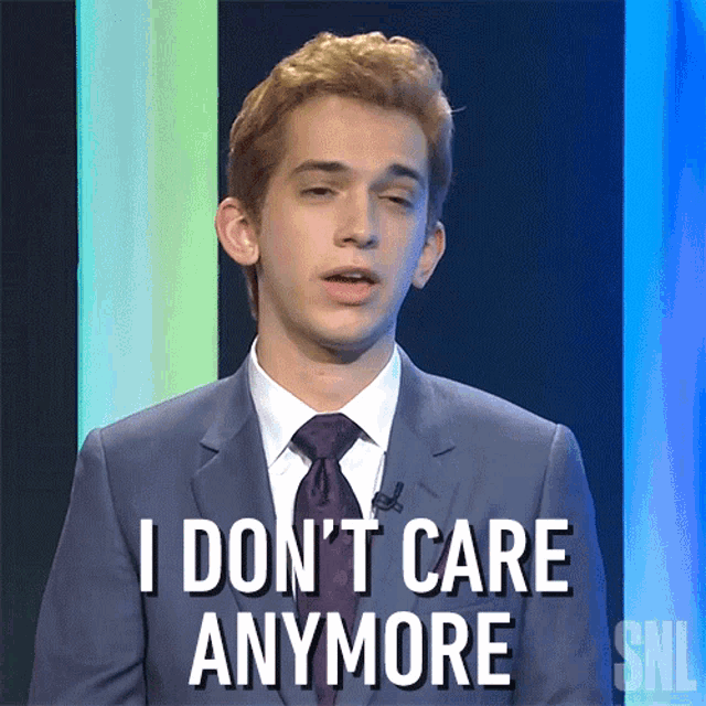 a man in a suit and tie says " i don t care anymore "