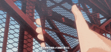 a person 's hand is reaching out towards a red staircase with chinese writing on it