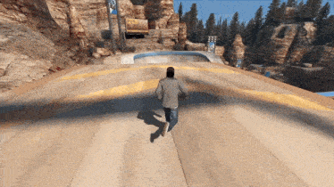 a man is walking down a wooden ramp with a sign that says ' a ' on it