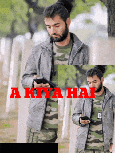 a man in a camouflage shirt is looking at his phone with the words akiya hai written in red