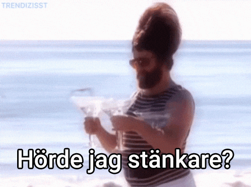 a man with a beard is holding a martini on the beach with the words horde jag stankare written below him