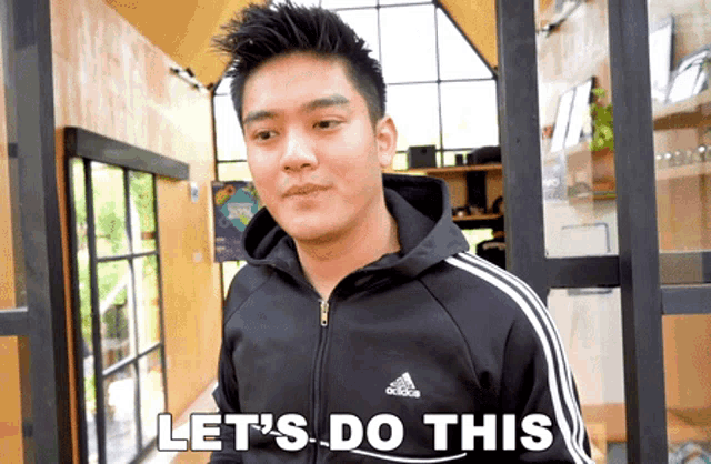 a man wearing an adidas jacket says " let 's do this "