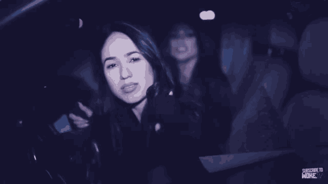 two women in a car with the words she 's lord farquaad