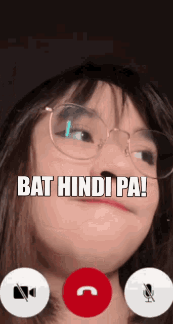 a girl wearing glasses is talking on a video call with the words bat hindi pa written above her