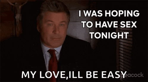 a man in a suit and tie is saying " i was hoping to have sex tonight my love , ill be easy "