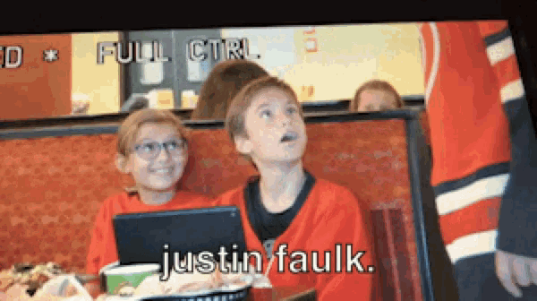 two young boys are sitting in a diner with the words justin faulk written on the screen