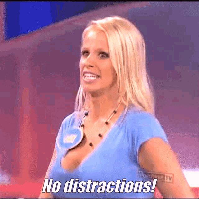a woman in a blue shirt says " no distractions " on the screen