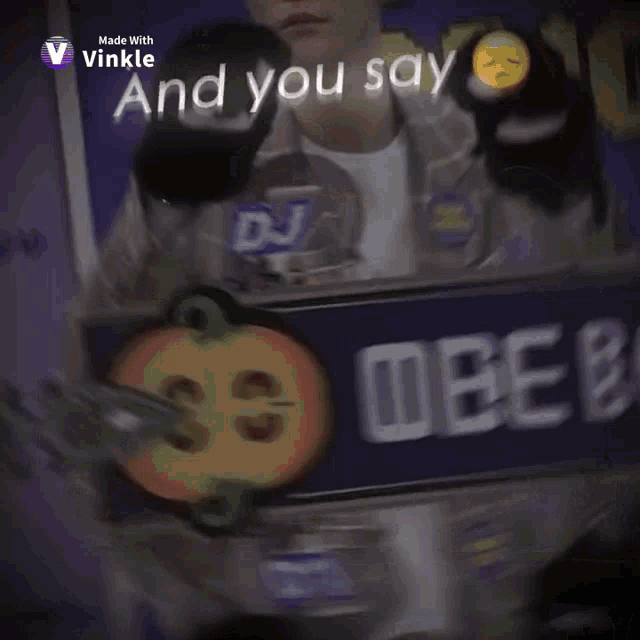 a man is holding a microphone with the words you say written on it