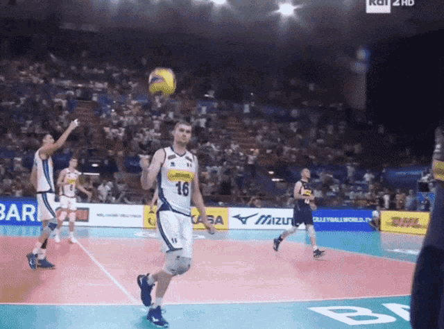 a volleyball player with the number 16 on the back of his shirt
