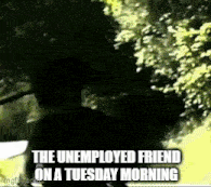 the unemployed friend on a tuesday morning is standing in front of a tree .